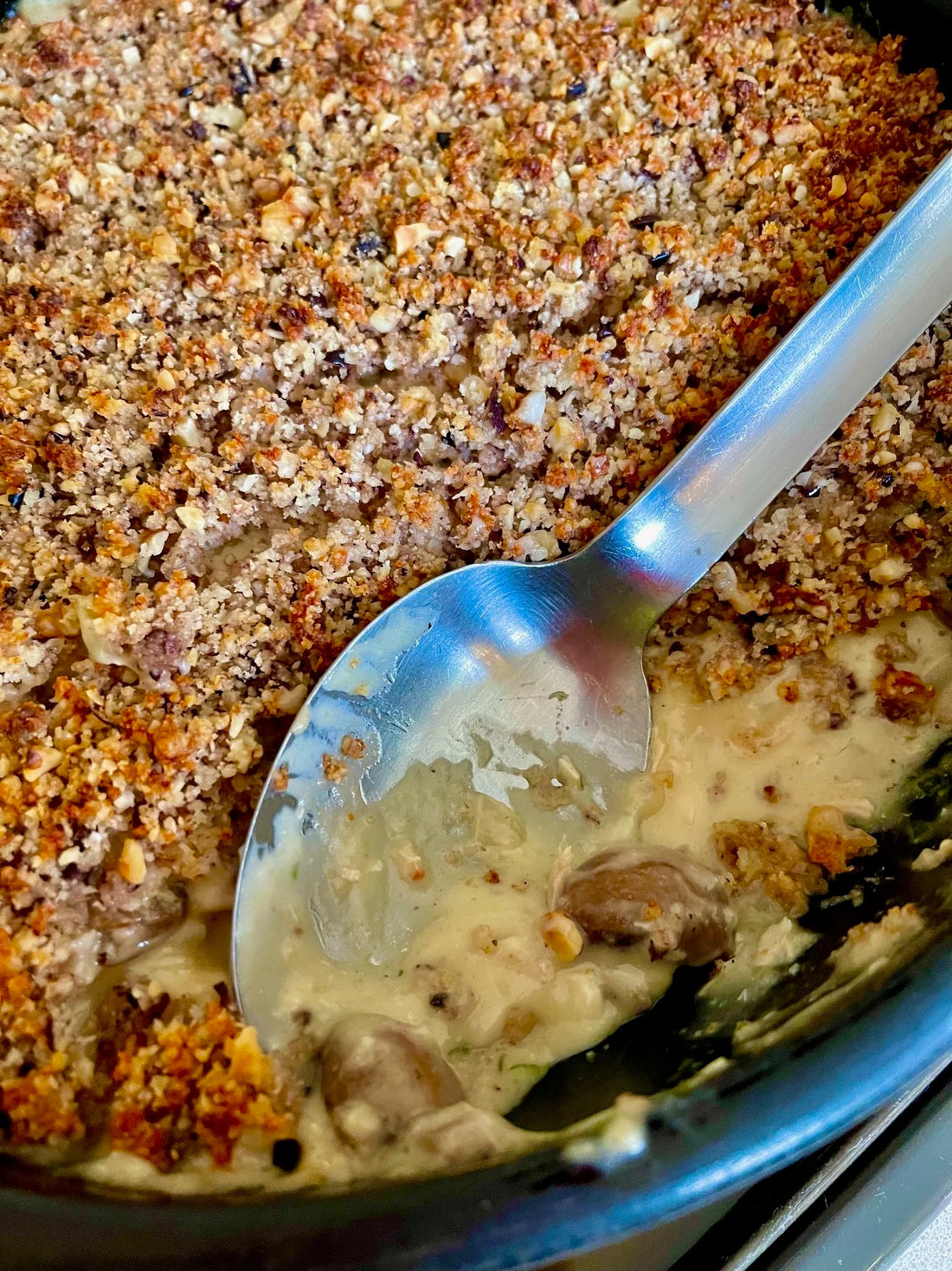 creamy tarragon turkey with walnut & black olive crumble